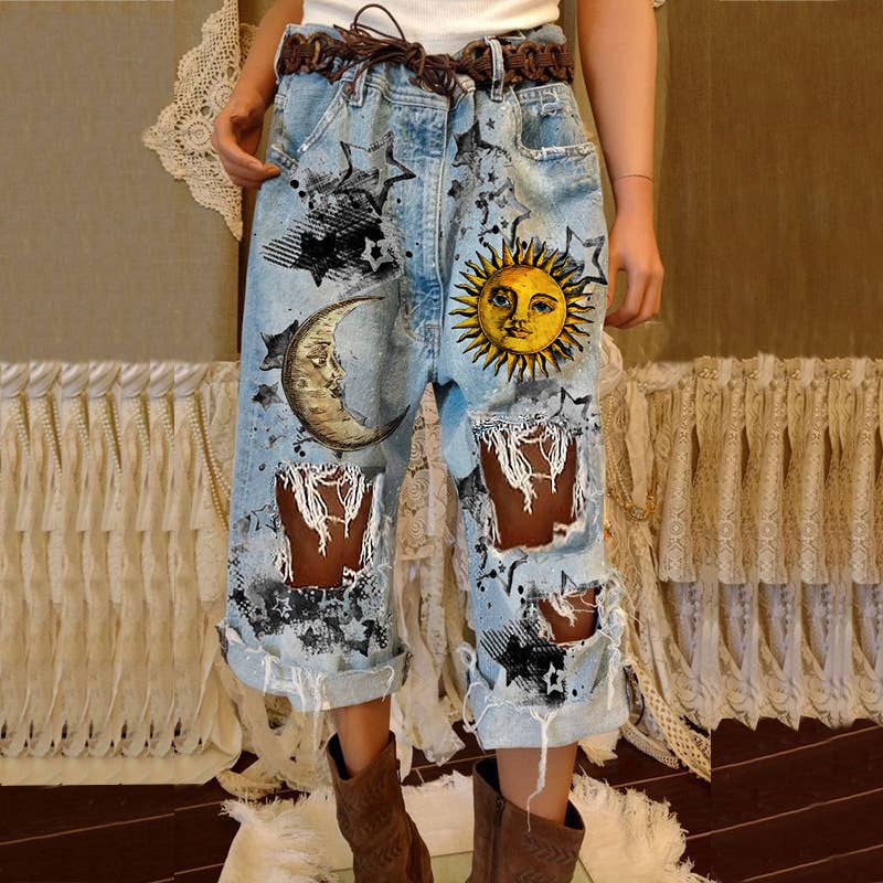 Women's sun, moon and star ripped jeans: Blue / M