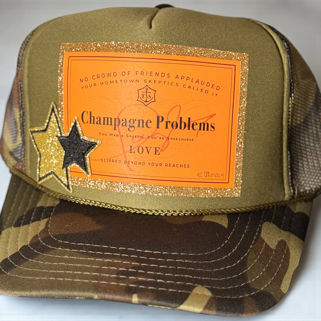 "Champagne Problems" Camo Glitter Trucker Hat : Dark Camo Hat - With Gold Star Patch