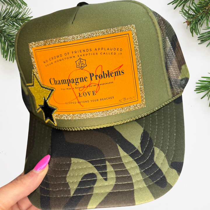 "Champagne Problems" Camo Glitter Trucker Hat : Dark Camo Hat - With Gold Star Patch