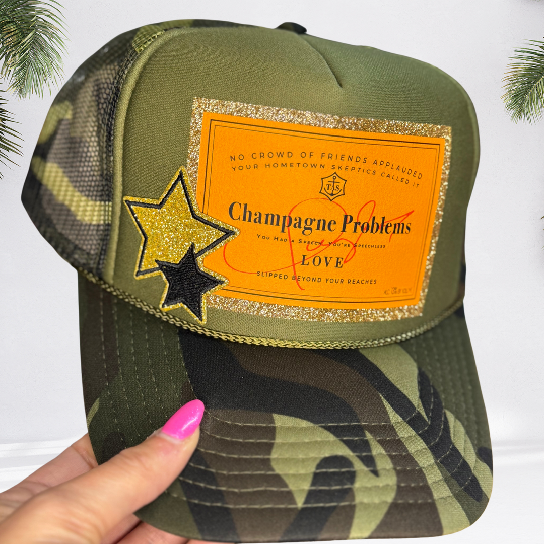 "Champagne Problems" Camo Glitter Trucker Hat : Dark Camo Hat - With Gold Star Patch